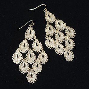 gold toned pierced earrings with textured tear drops